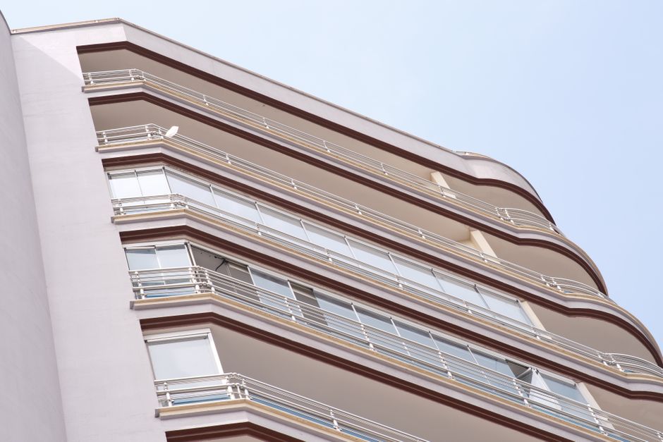 Low angle view of a modern apartment building in İzmir, showcasing residential urban architecture